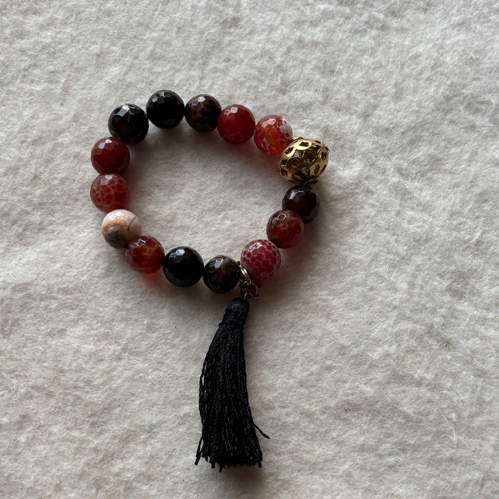 Elegant Beaded Bracelet with Tassel